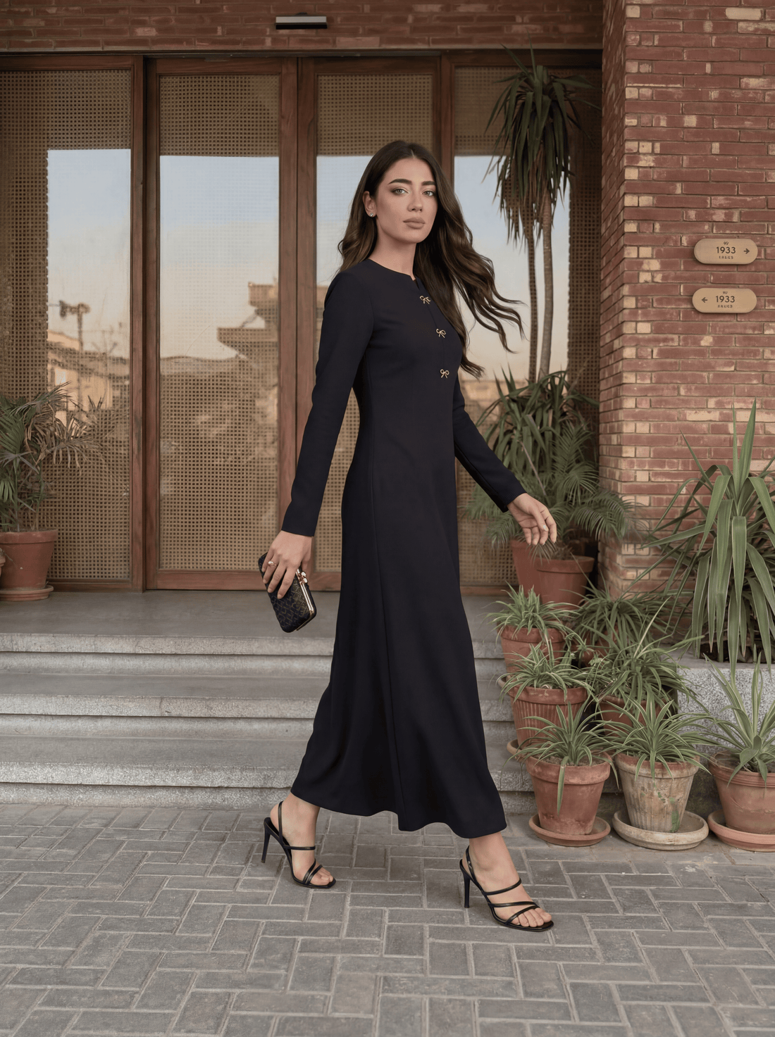 Elegant long dress with a clean, tailored silhouette