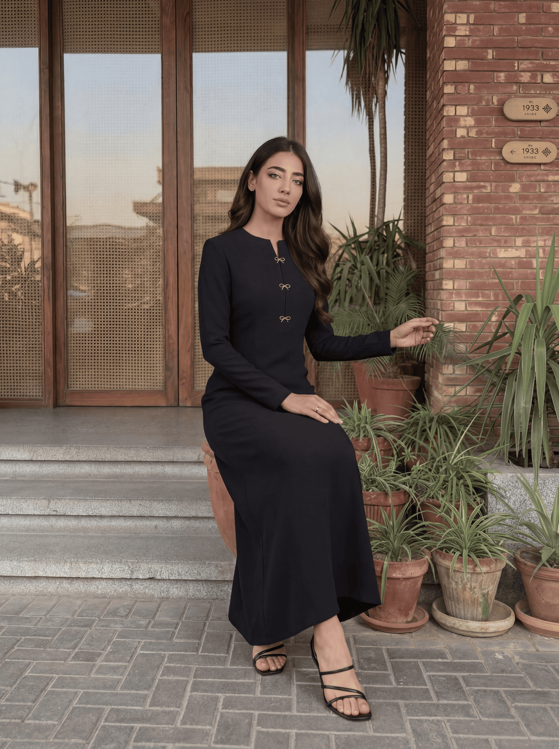 Elegant long dress with a clean, tailored silhouette