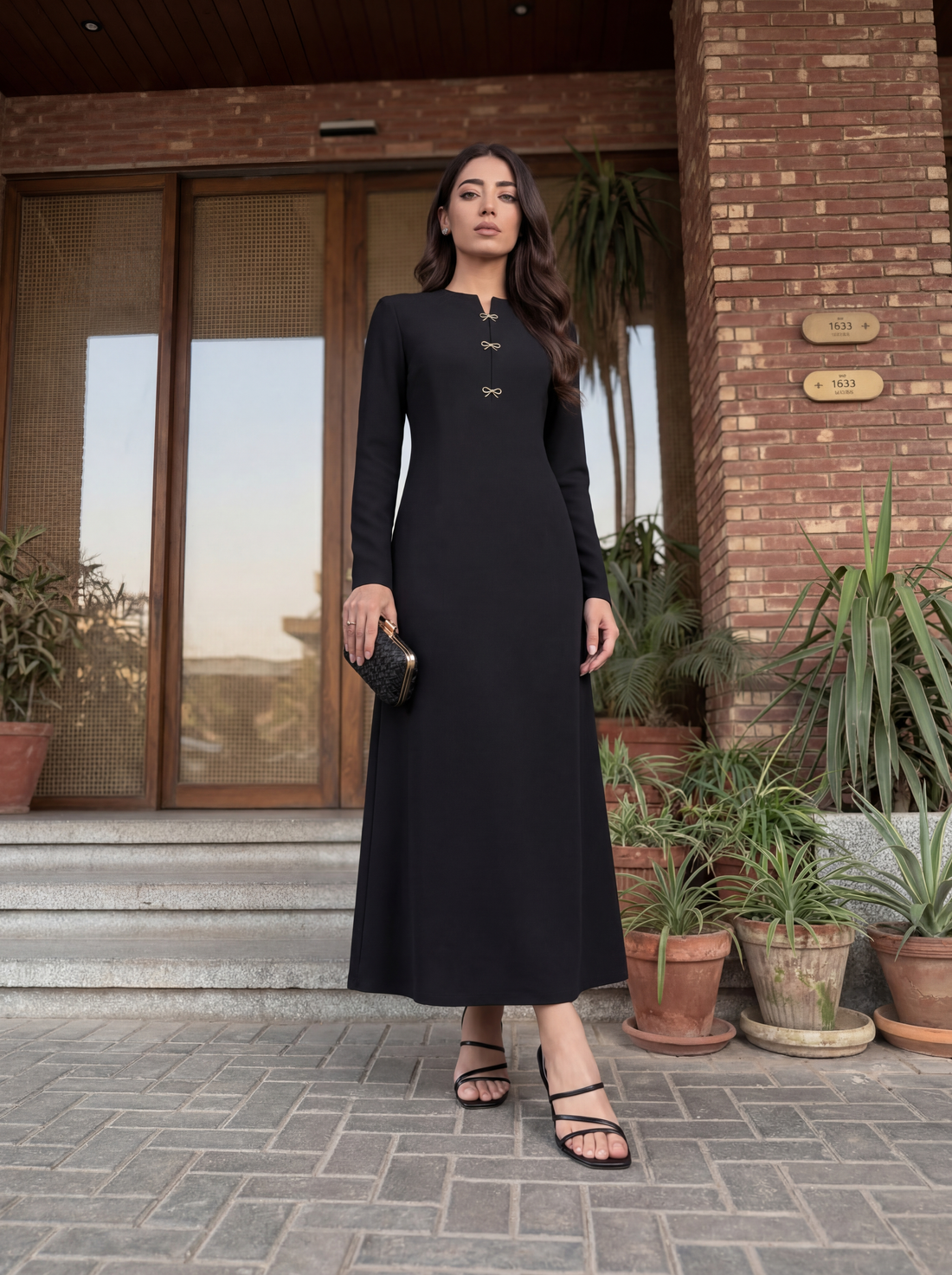 Elegant long dress with a clean, tailored silhouette