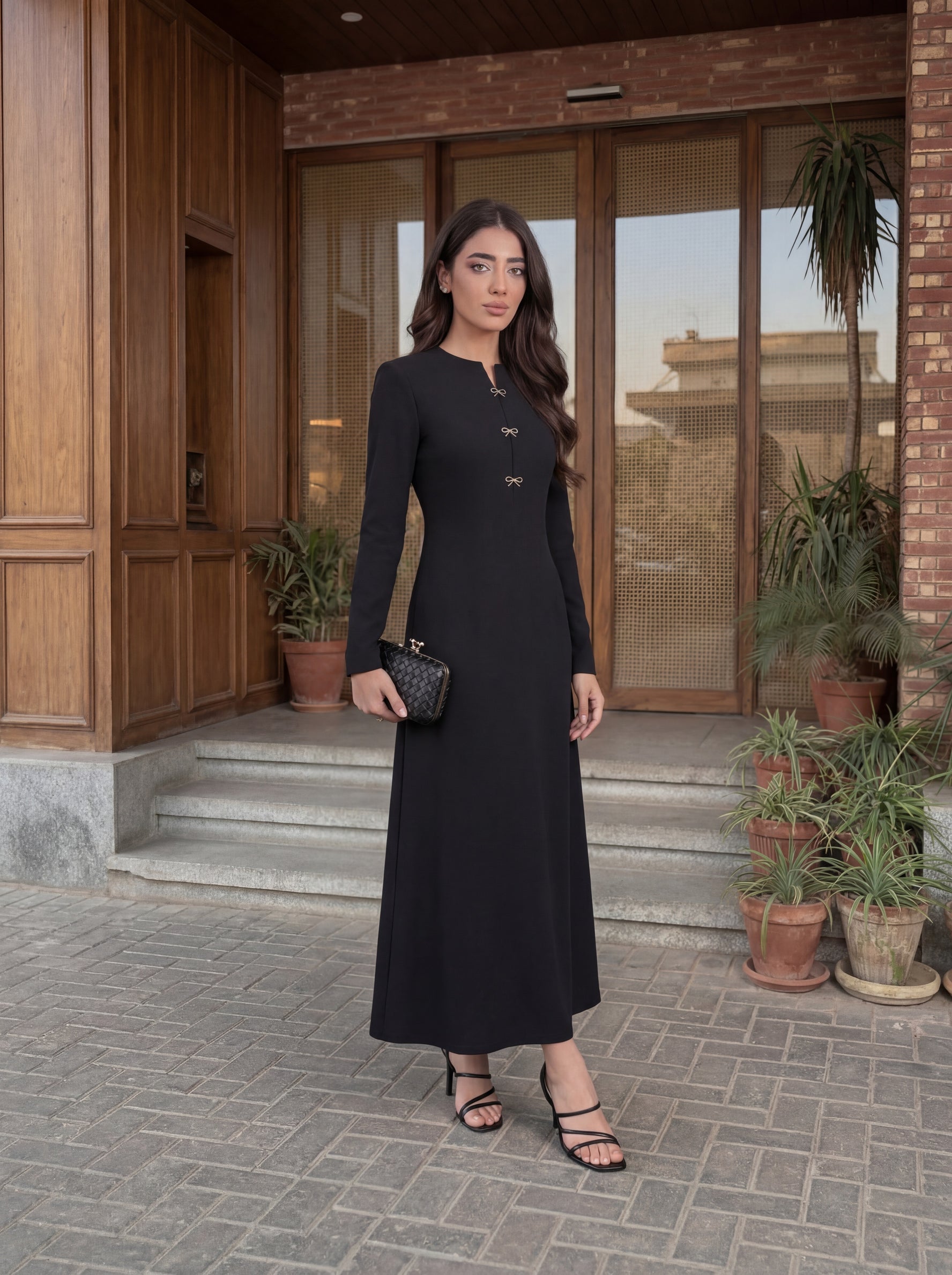 Elegant long dress with a clean, tailored silhouette
