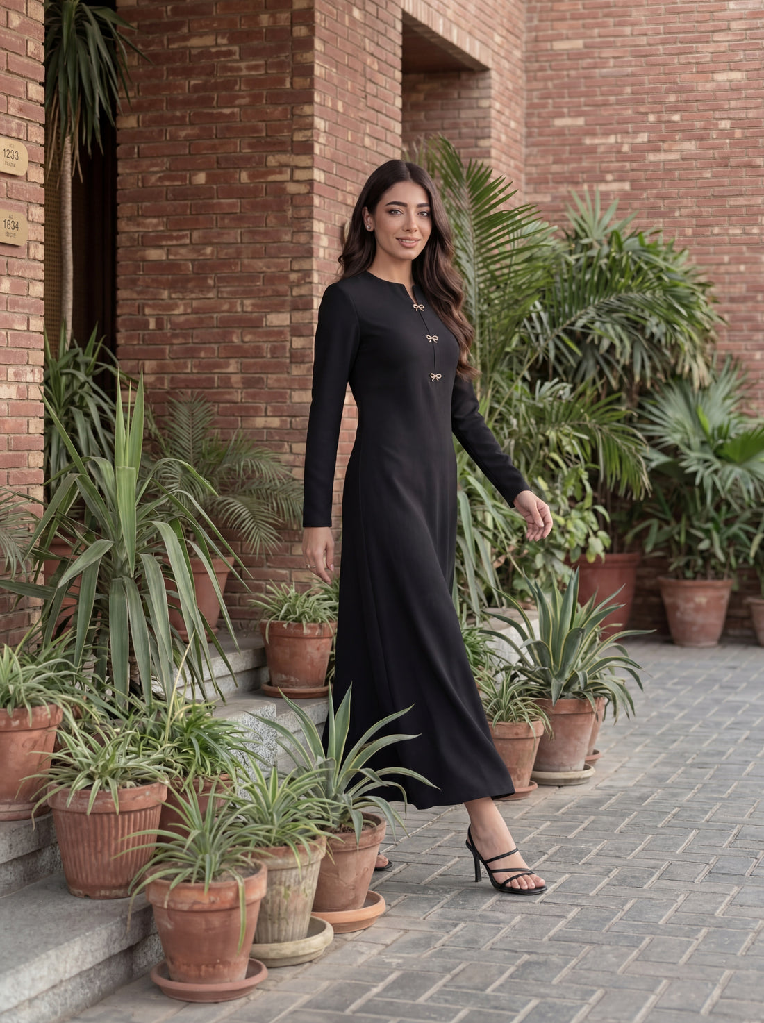 Elegant long dress with a clean, tailored silhouette