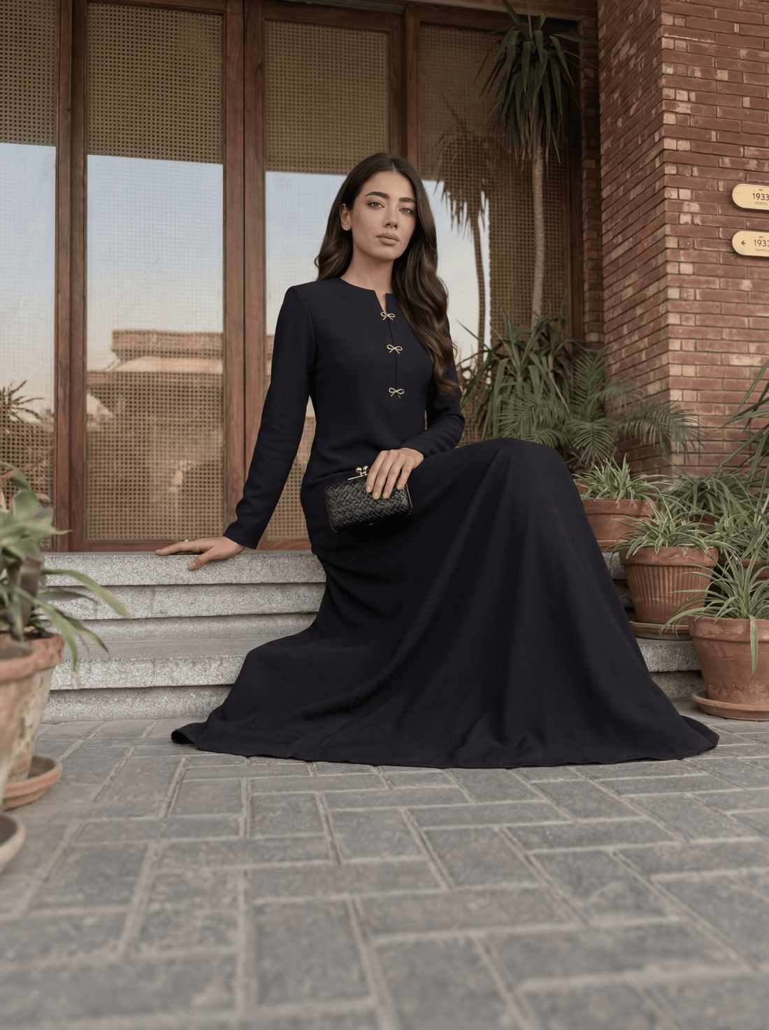 Elegant long dress with a clean, tailored silhouette
