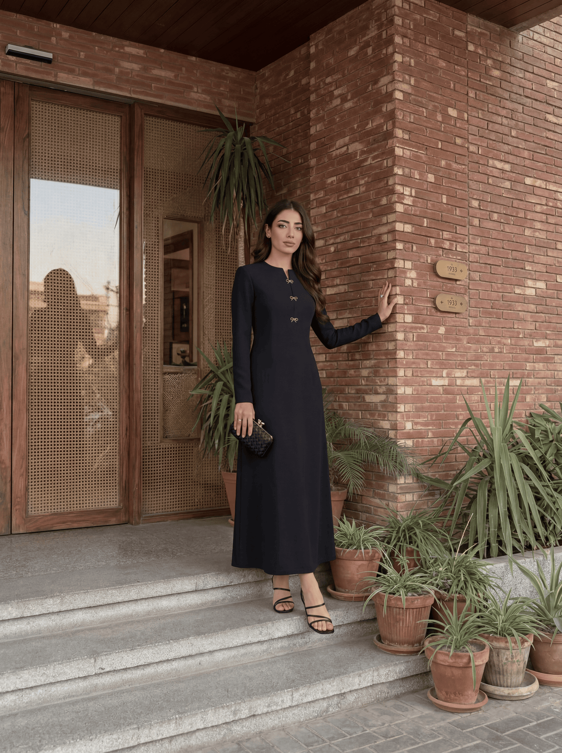 Elegant long dress with a clean, tailored silhouette